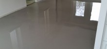 Egaliseren van woonkamer en M-flor PVC stroken geplaatst Egaliseren van woonkamer en M-flor PVC stroken geplaatst